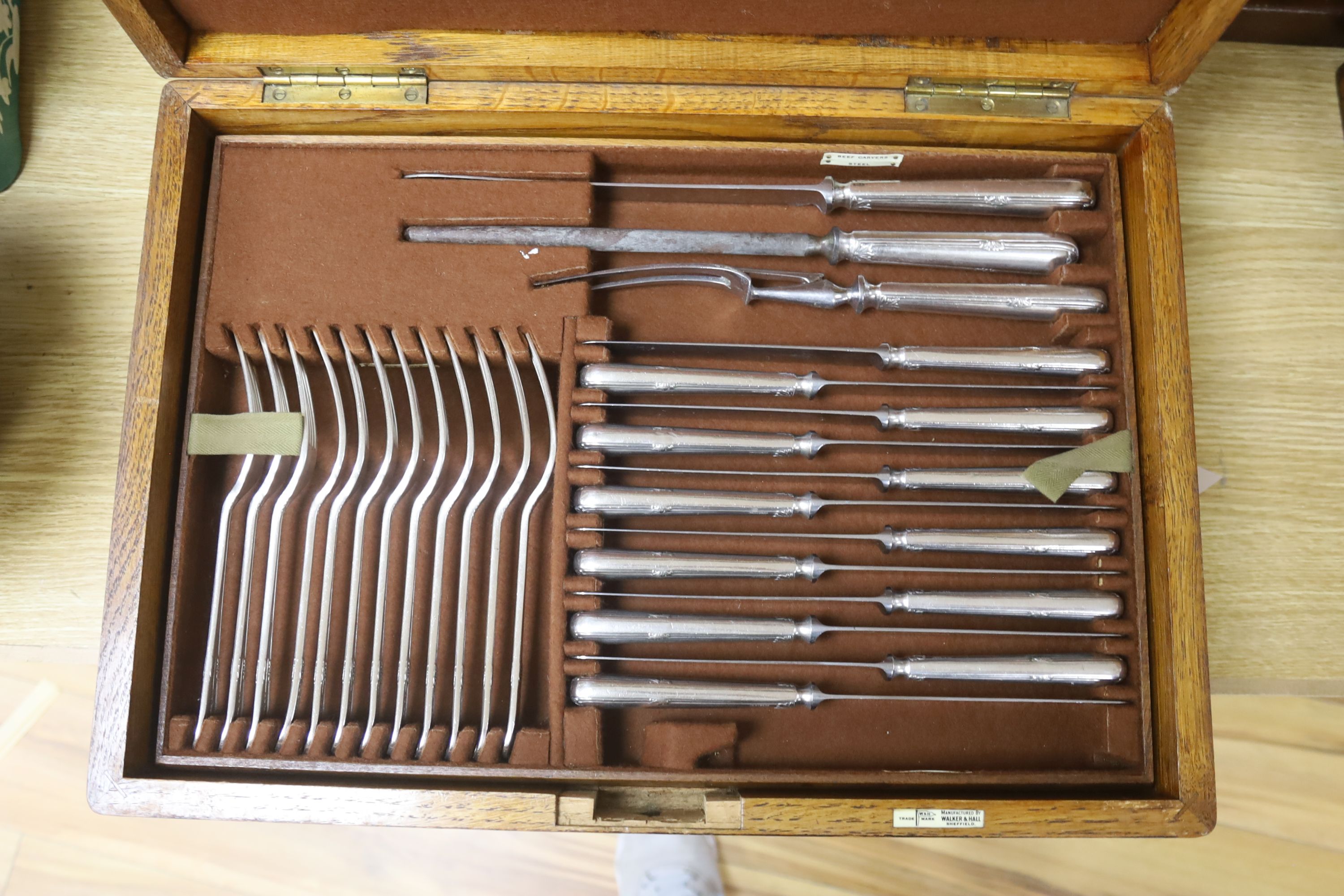 A service of Walker & Hall Laurel pattern plated flatware in oak canteen (100 plus pieces)